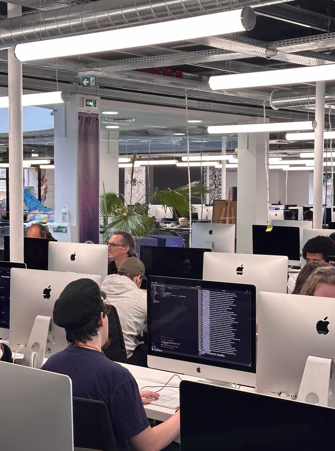 Participants working on CTF challenges in the 42 Perpignan computer labs